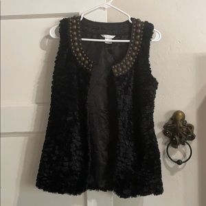 Beautifully textured black vest. It’s super soft.